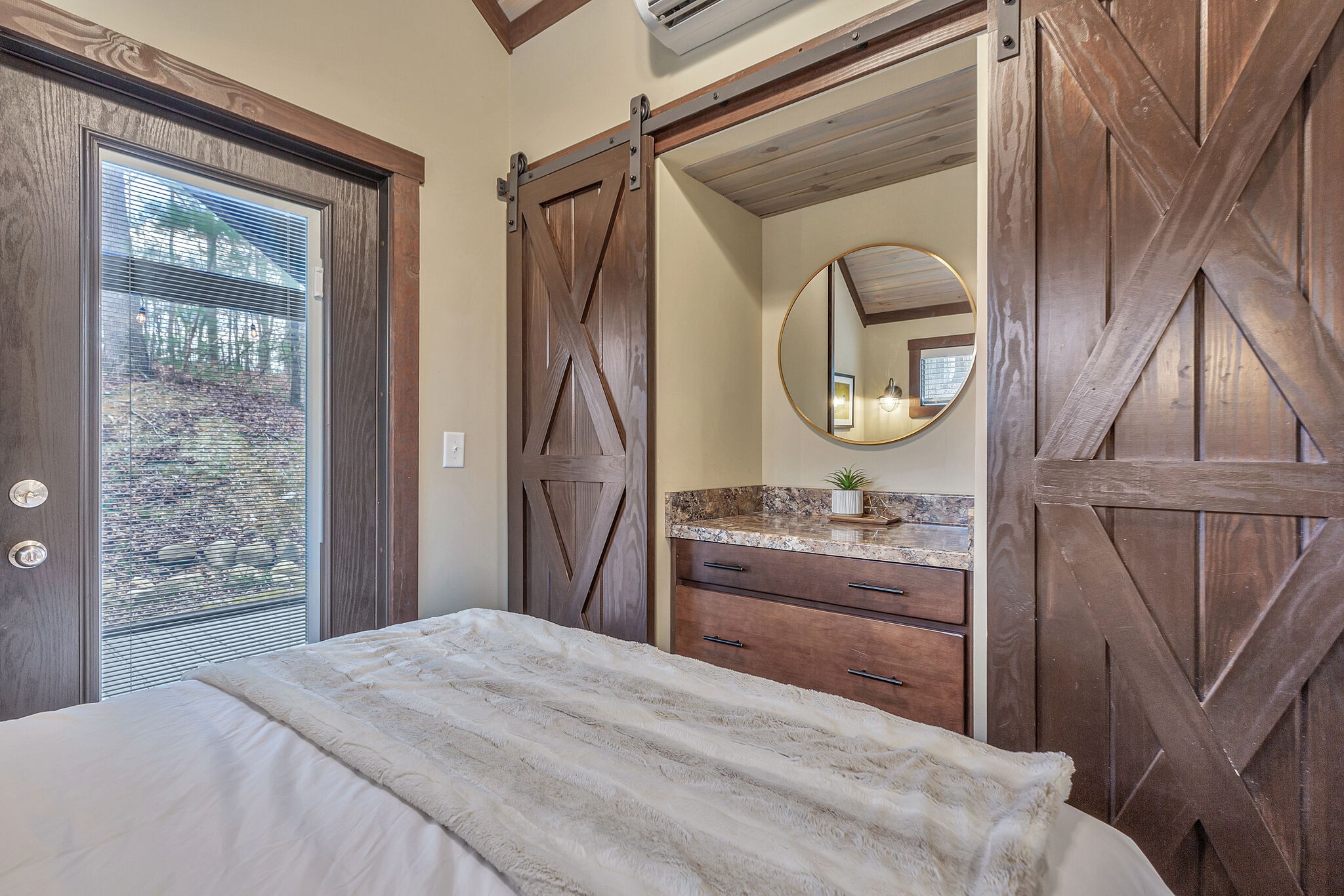 42 Oakleaf Trail Tracy City, TN 37387 - Photo 56 of 73 a bedroom with a bed and dresser with mirror