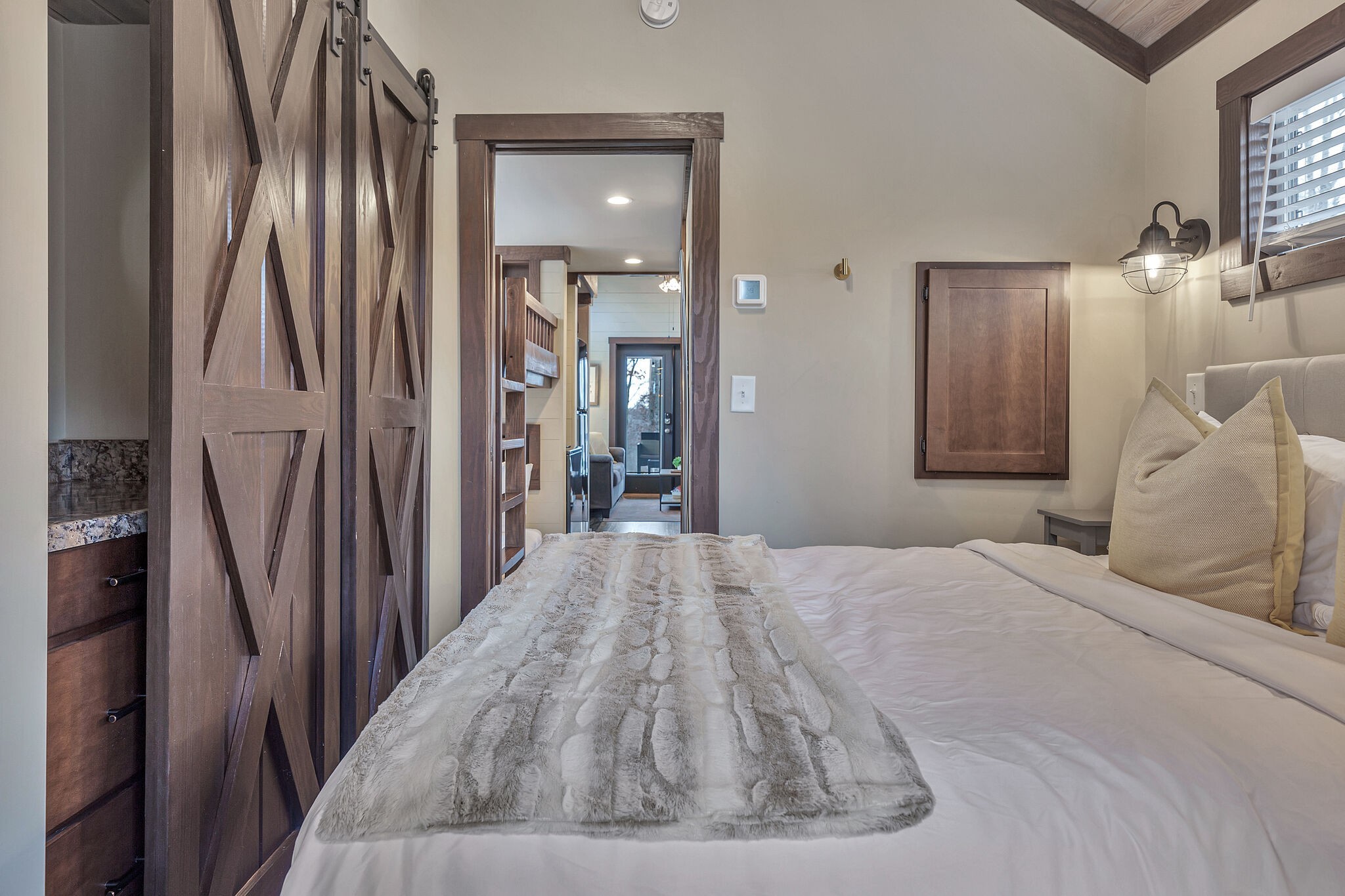 42 Oakleaf Trail Tracy City, TN 37387 - Photo 57 of 73 a bedroom with a bed and a mirror