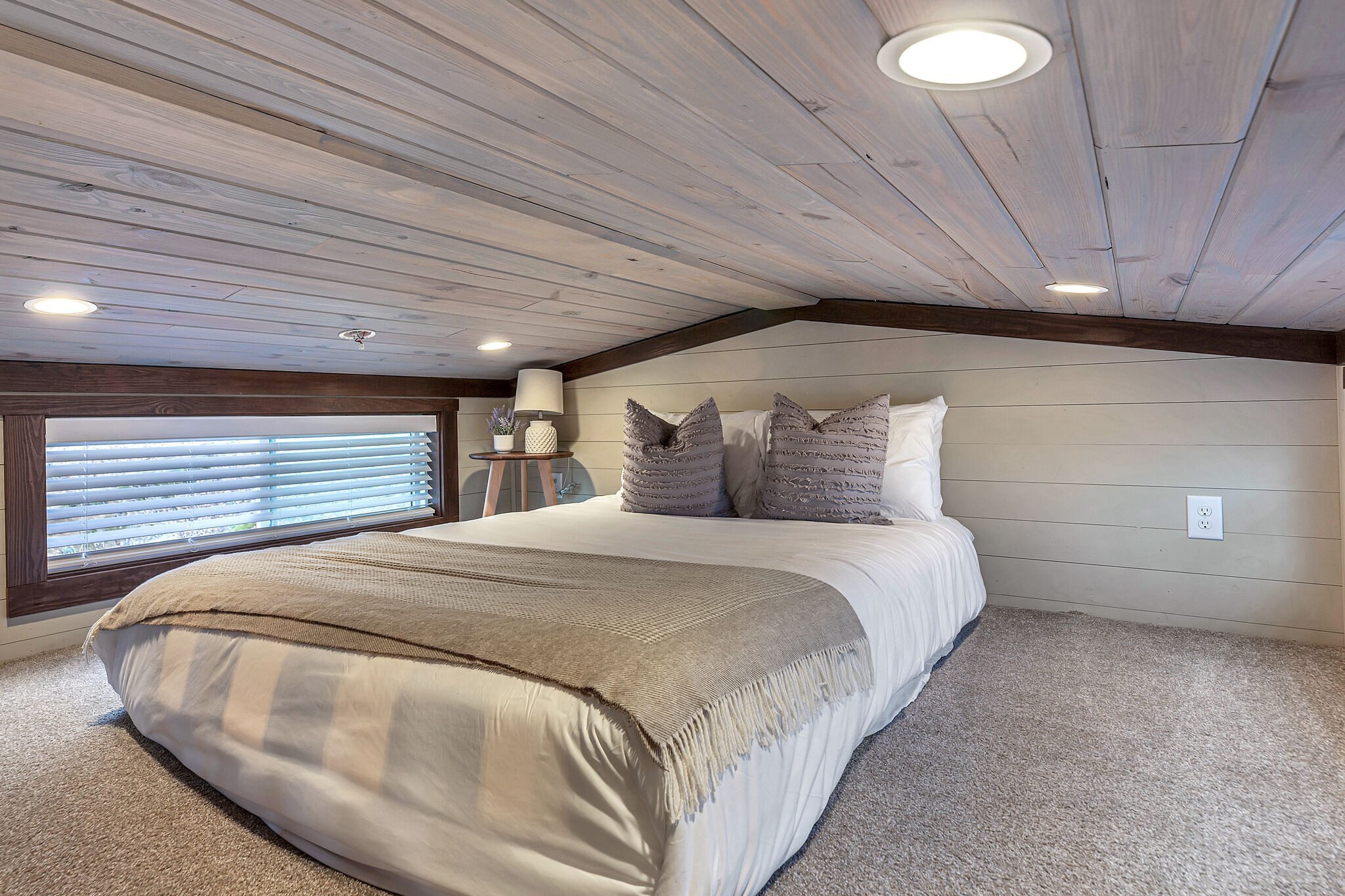 42 Oakleaf Trail Tracy City, TN 37387 - Photo 60 of 73 a bed sitting in a spacious bedroom next to a larger window