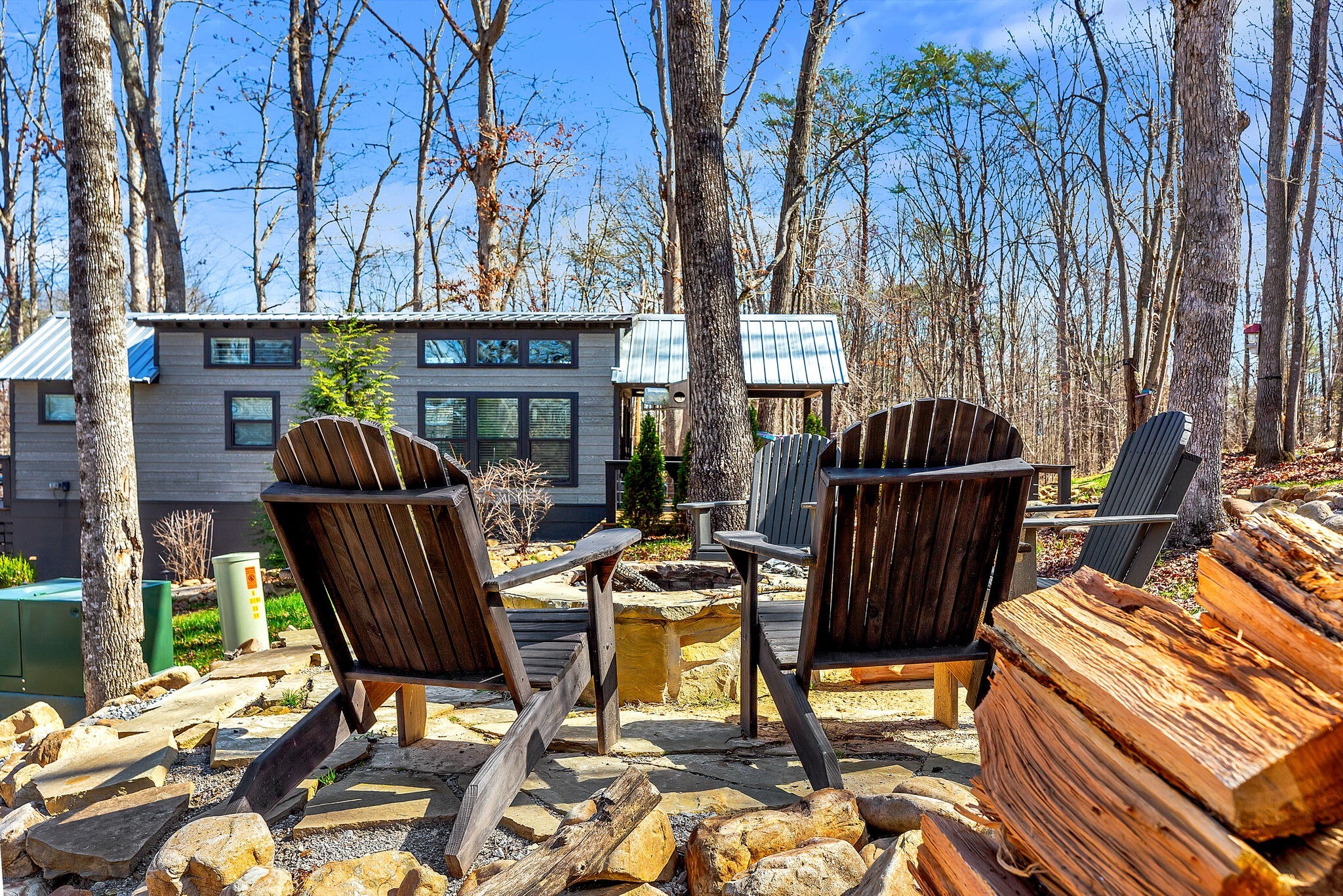 42 Oakleaf Trail Tracy City, TN 37387 - Photo 7 of 73 a view of a chairs and table in patio with a fire pit