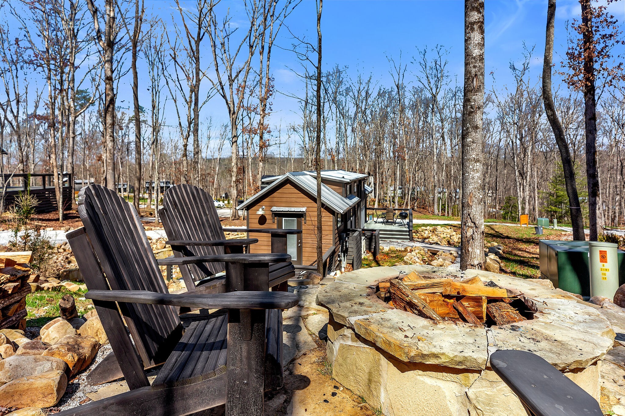 42 Oakleaf Trail Tracy City, TN 37387 - Photo 8 of 73 a view of a patio with chairs and table on the wooden floor