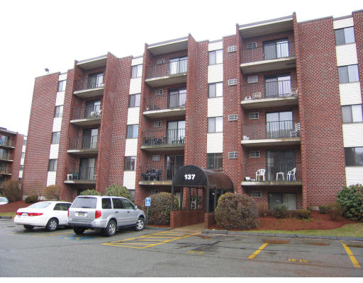 a cars parked in front of a building