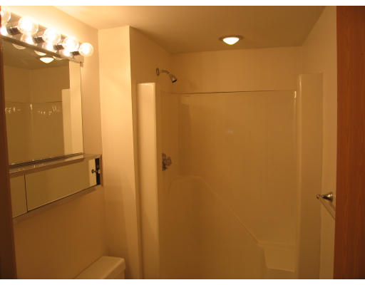 137 Franklin Street, Unit 102 Stoneham, MA 02180 - Photo 8 of 8 a bathroom with a shower