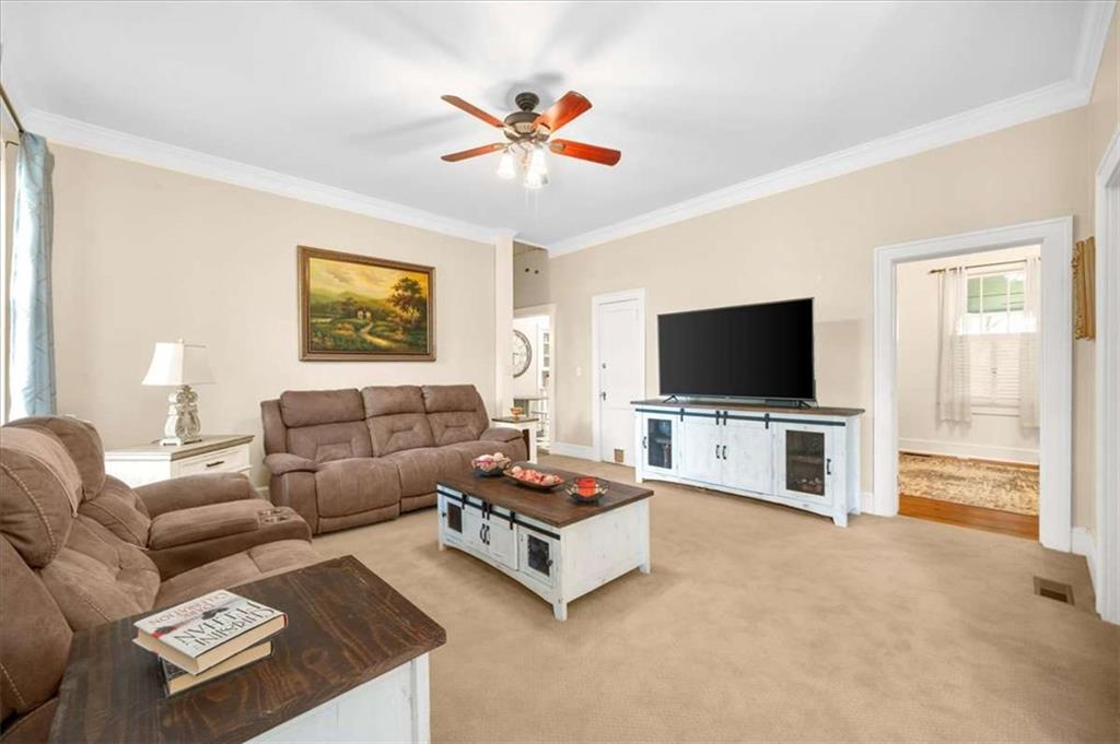 106 Westmore Road Southwest Rome, GA 30165 - Photo 25 of 56 a living room with furniture and a flat screen tv