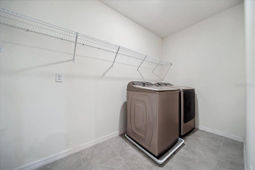 8110 Southwest 59th Terrace Ocala, FL 34476 - Photo 32 of 35 a utility room with dryer and washer