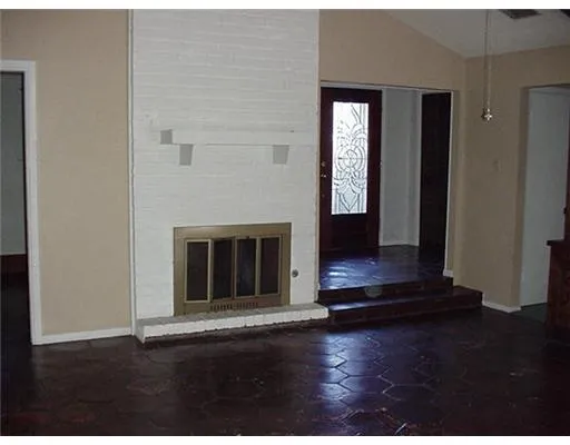 a living room with a fireplace
