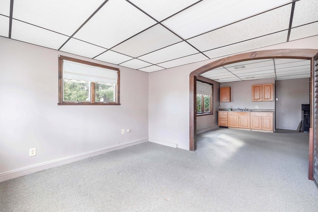 582 Springfield Street Feeding Hills, MA 01030 - Photo 19 of 42 an empty room with windows