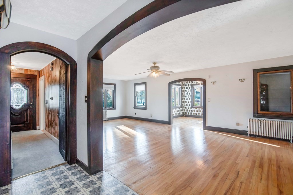 582 Springfield Street Feeding Hills, MA 01030 - Photo 2 of 42 a view of an entryway with wooden floor and a livingroom