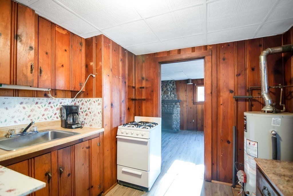582 Springfield Street Feeding Hills, MA 01030 - Photo 25 of 42 a kitchen with stainless steel appliances a refrigerator and a sink