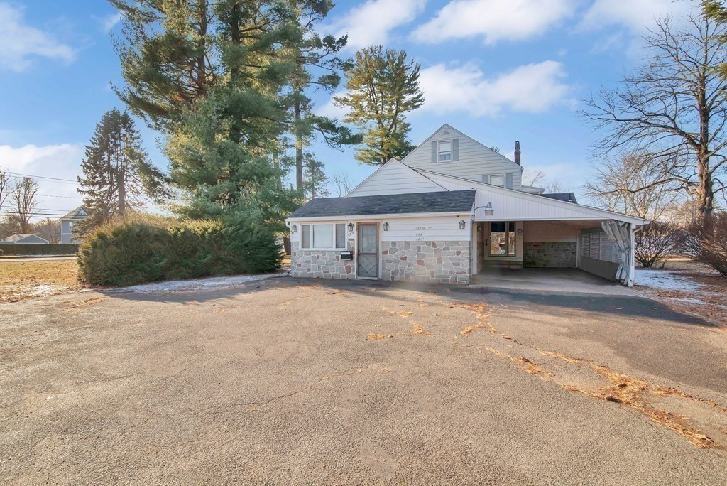 582 Springfield Street Feeding Hills, MA 01030 - Photo 37 of 42 a front view of a house with a yard and garage