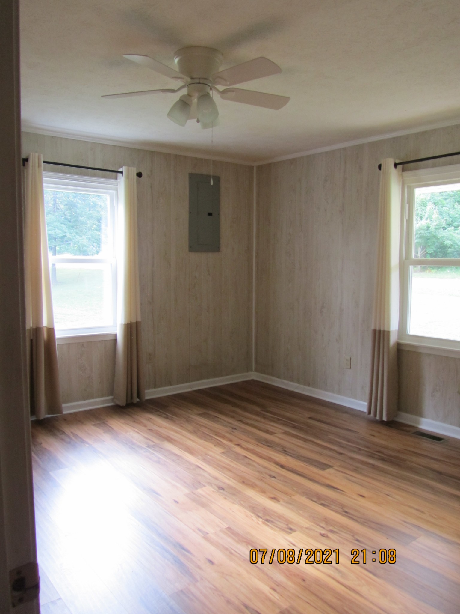 751 Palmyra Road Clarksville, TN 37040 - Photo 17 of 22 a view of an empty room with wooden floor and a window