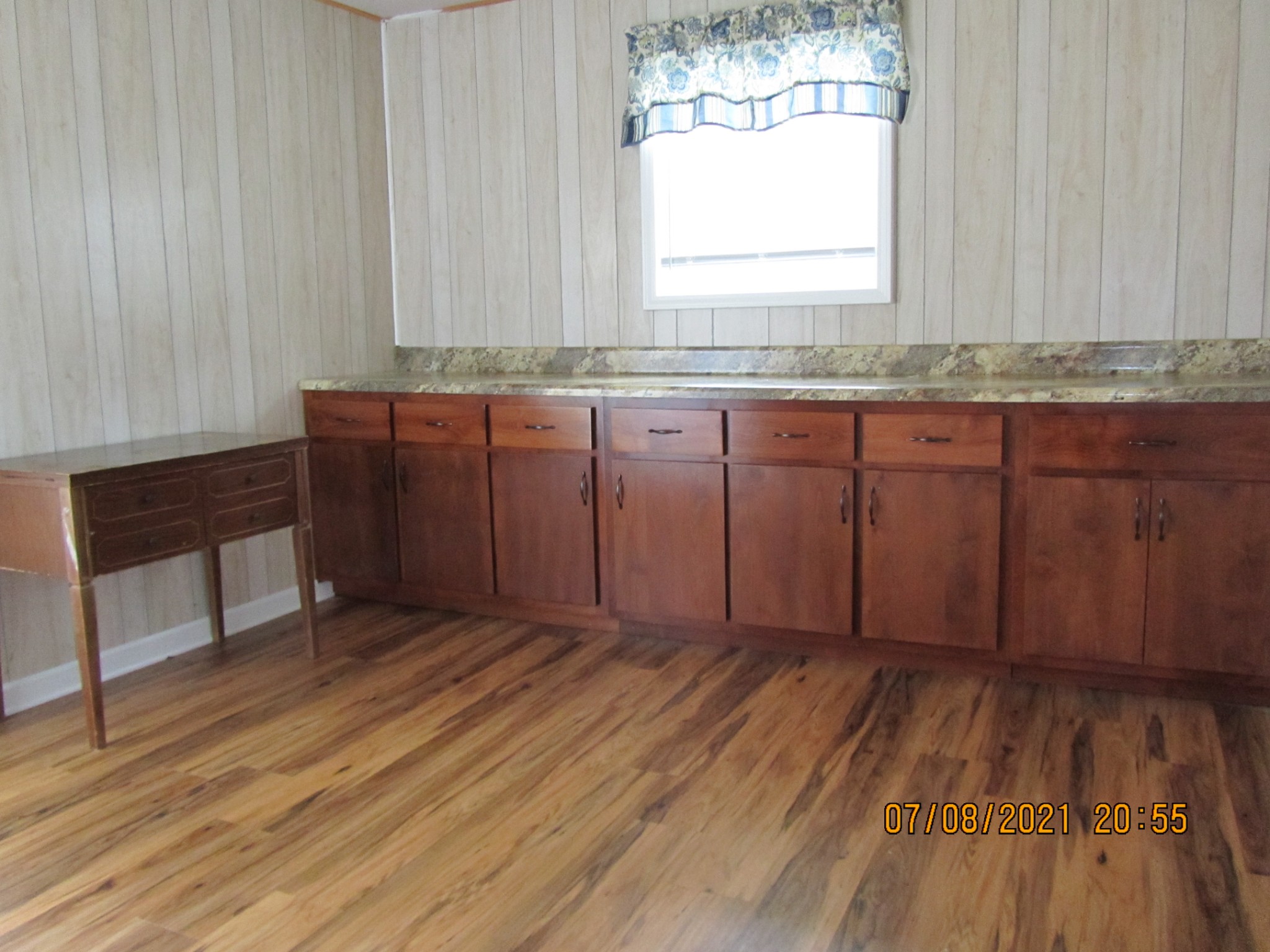 751 Palmyra Road Clarksville, TN 37040 - Photo 6 of 22 a view of kitchen with granite countertop window and wooden floor
