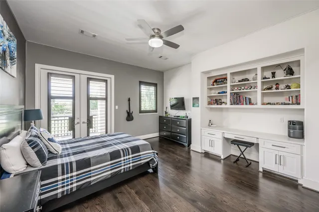 a bathroom with a granite countertop sink shower and a mirror