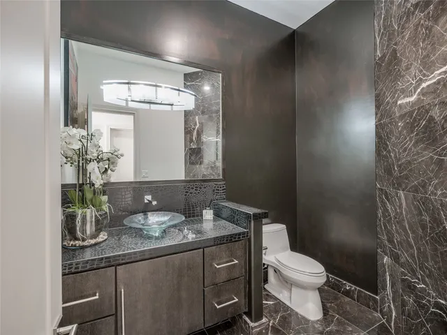 a view of a kitchen with workspace and windows