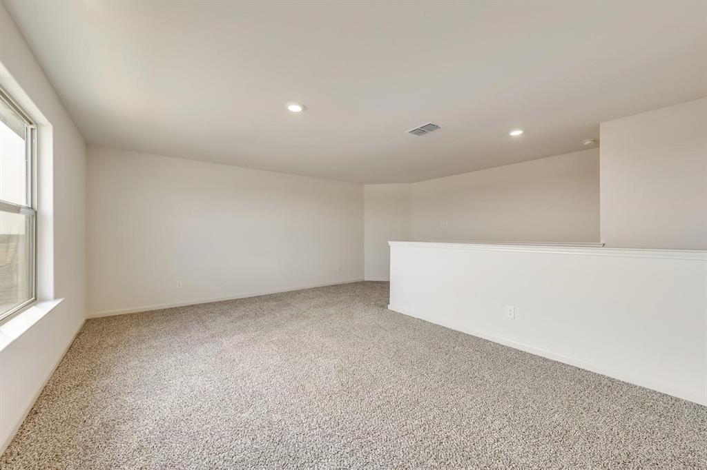8126 Big Timber Trail Ponder, TX 76259 - Photo 11 of 16 an empty room with a window