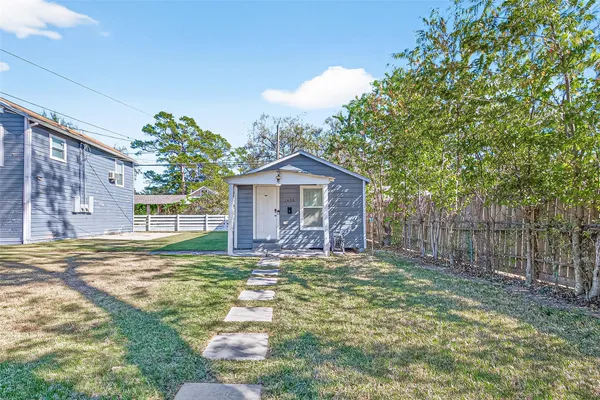a house view with a garden space
