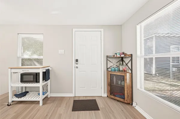 a view of livingroom with furniture and flat screen tv