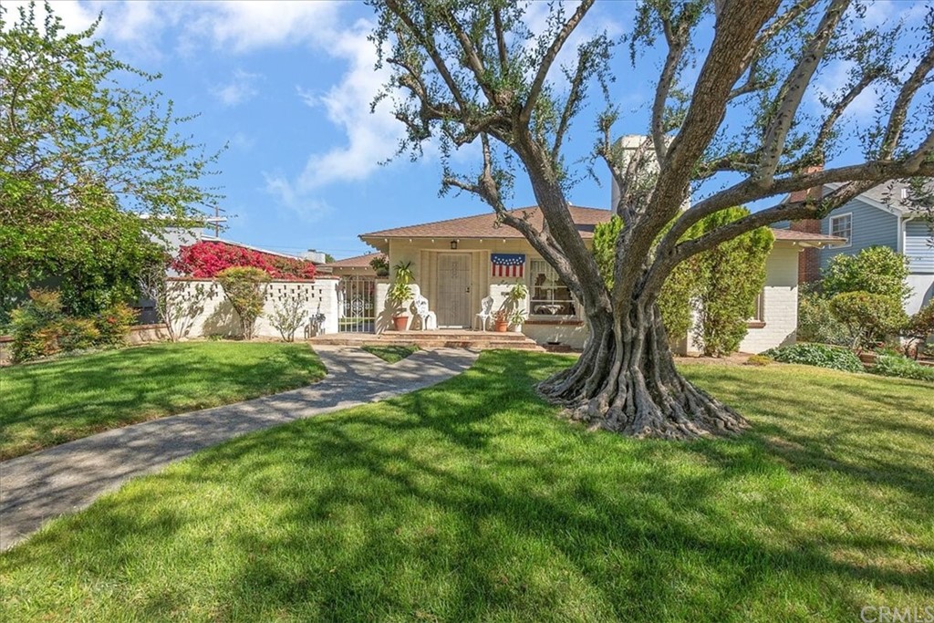 876 North 1st Avenue Upland, CA 91786 - Photo 2 of 30 a view of a tree in front of a house