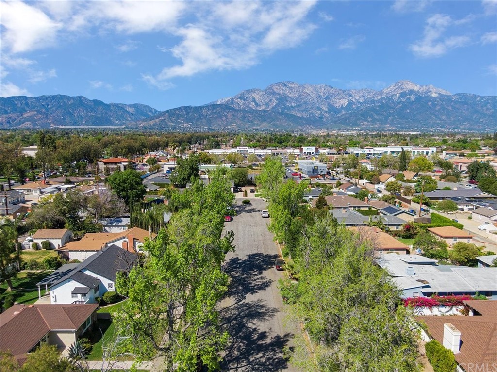 876 North 1st Avenue Upland, CA 91786 - Photo 30 of 30 an aerial view of residential house with outdoor space and mountain view