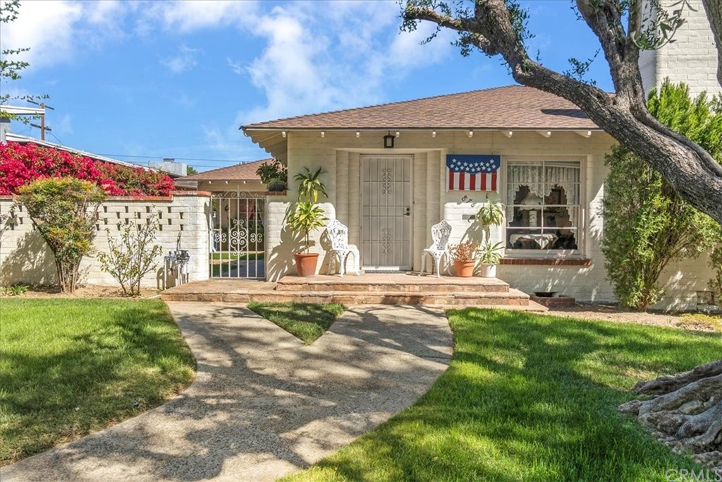 876 North 1st Avenue Upland, CA 91786 - Photo 3 of 30 front view of a house with a yard