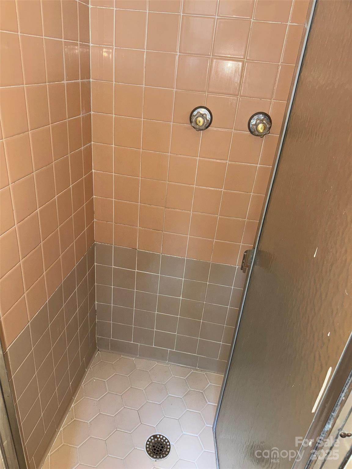 802 Roberdell Road Rockingham, NC 28379 - Photo 34 of 43 a bathroom with a shower