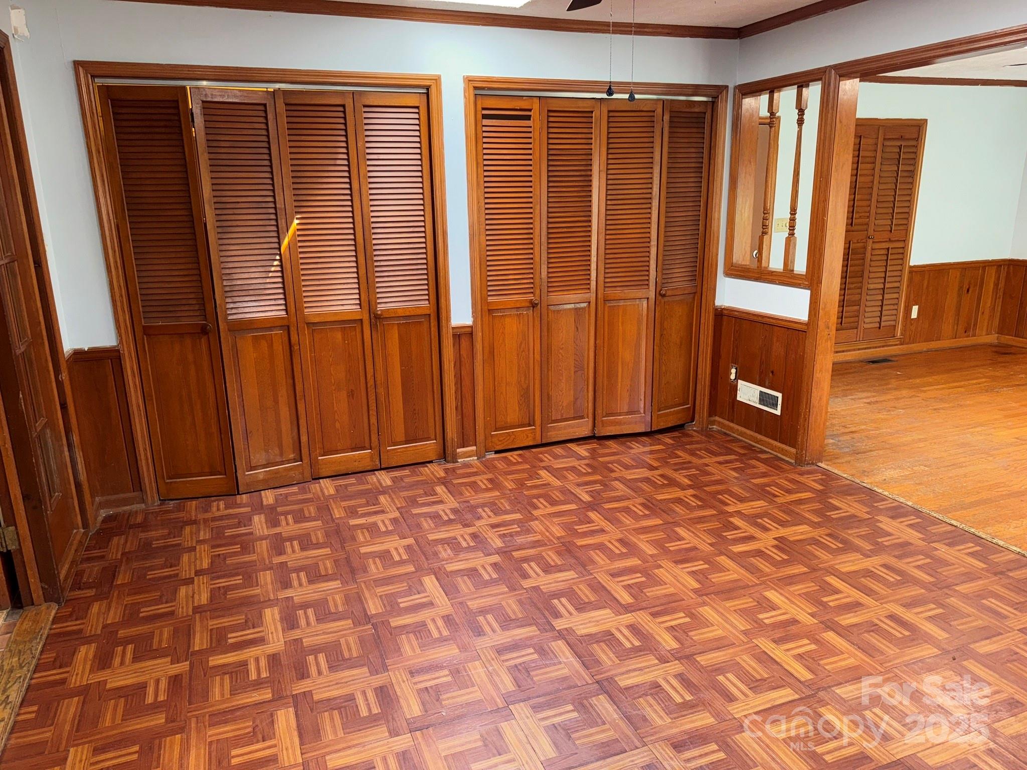 802 Roberdell Road Rockingham, NC 28379 - Photo 9 of 43 a view of a livingroom with wooden floor and a window