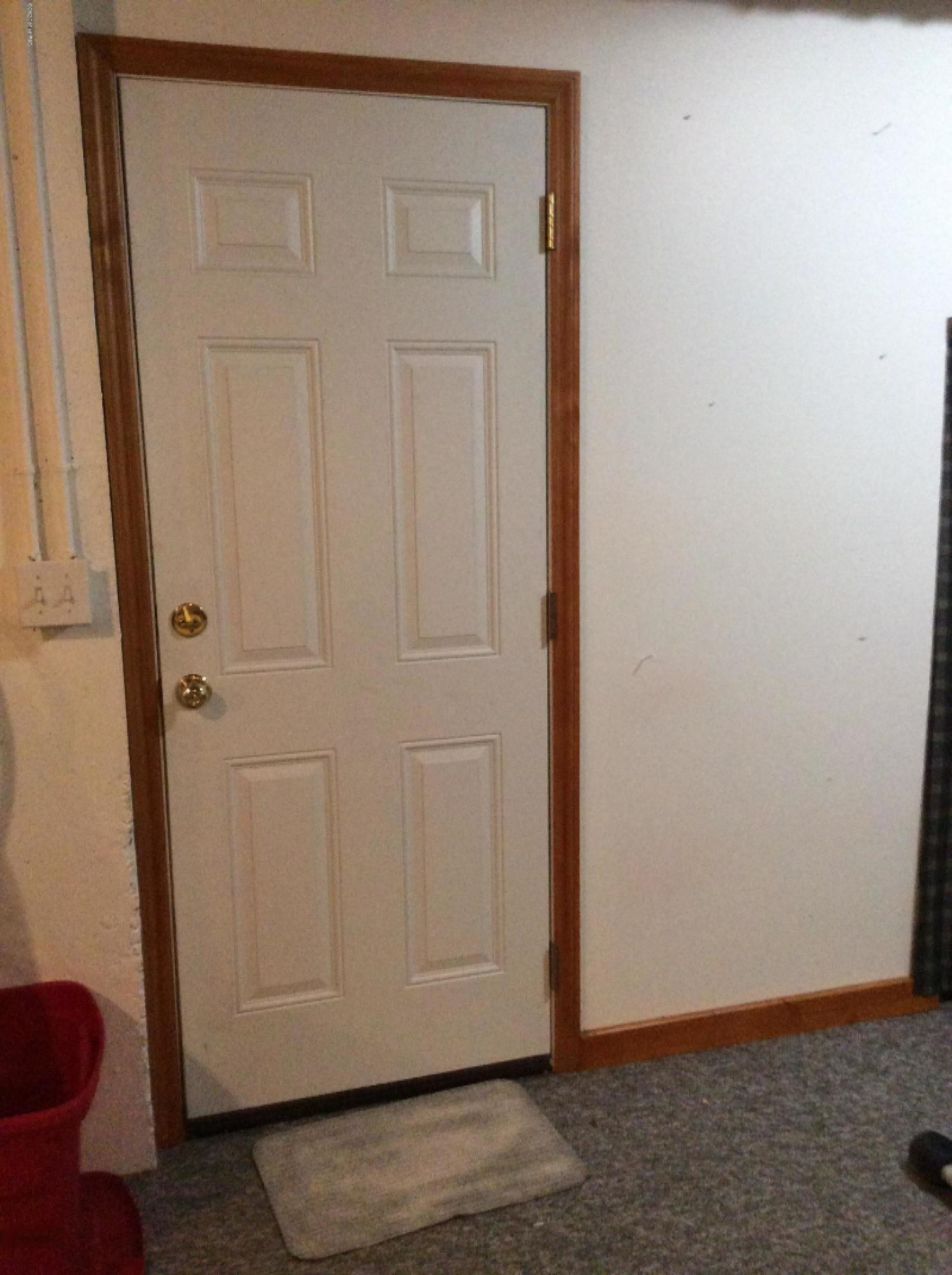 1433 Timber Ridge Drive Manistee, MI 49660 - Photo 61 of 75 Door to Staircase to Garage