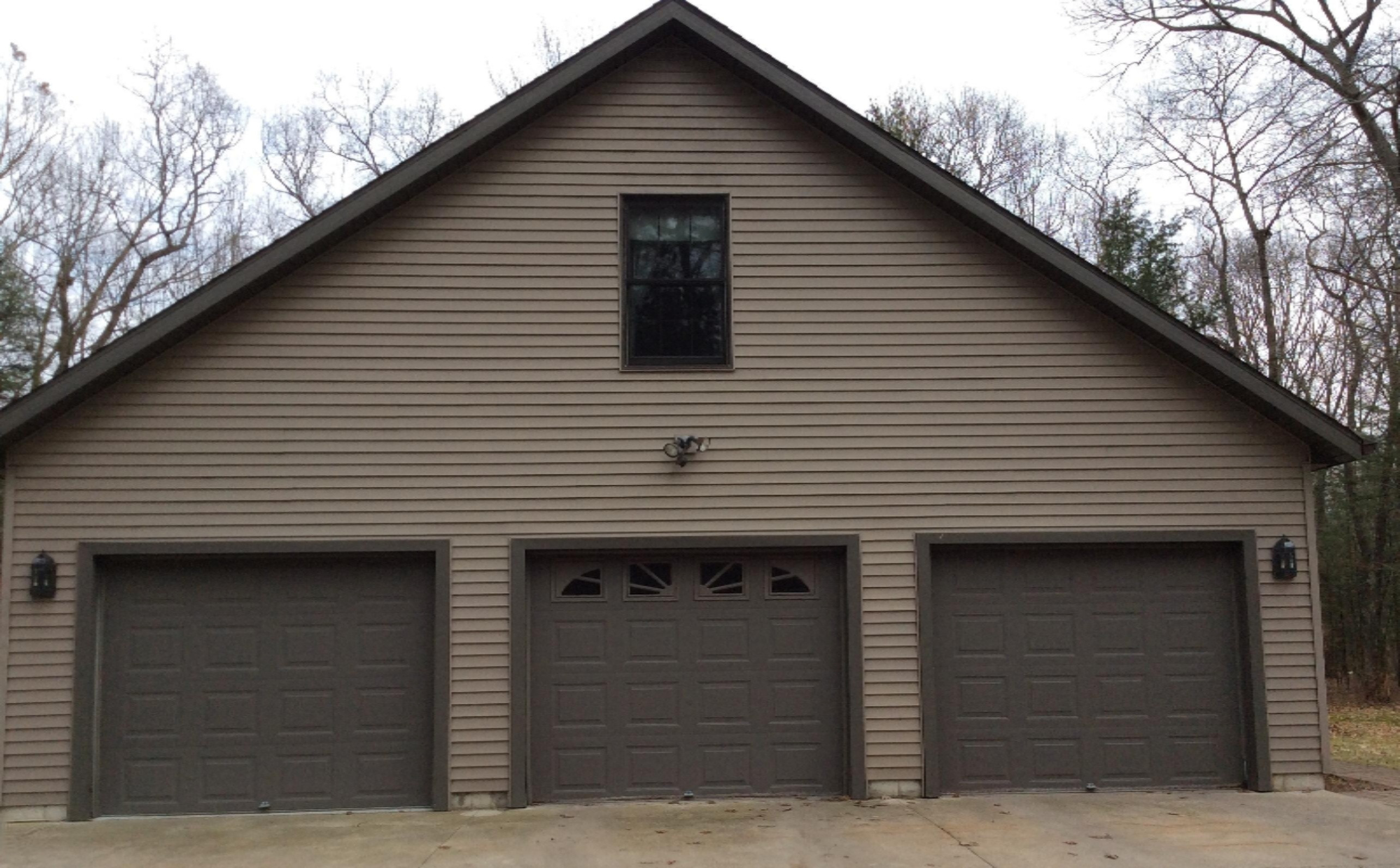 1433 Timber Ridge Drive Manistee, MI 49660 - Photo 64 of 75 3 Stall Garage