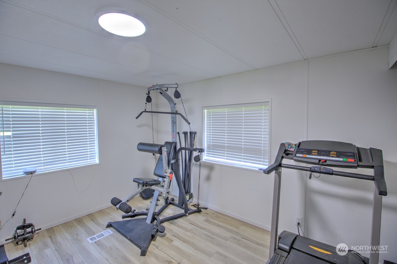 435 Jones Road Winlock, WA 98596 - Photo 12 of 30 a view of a room with gym equipment