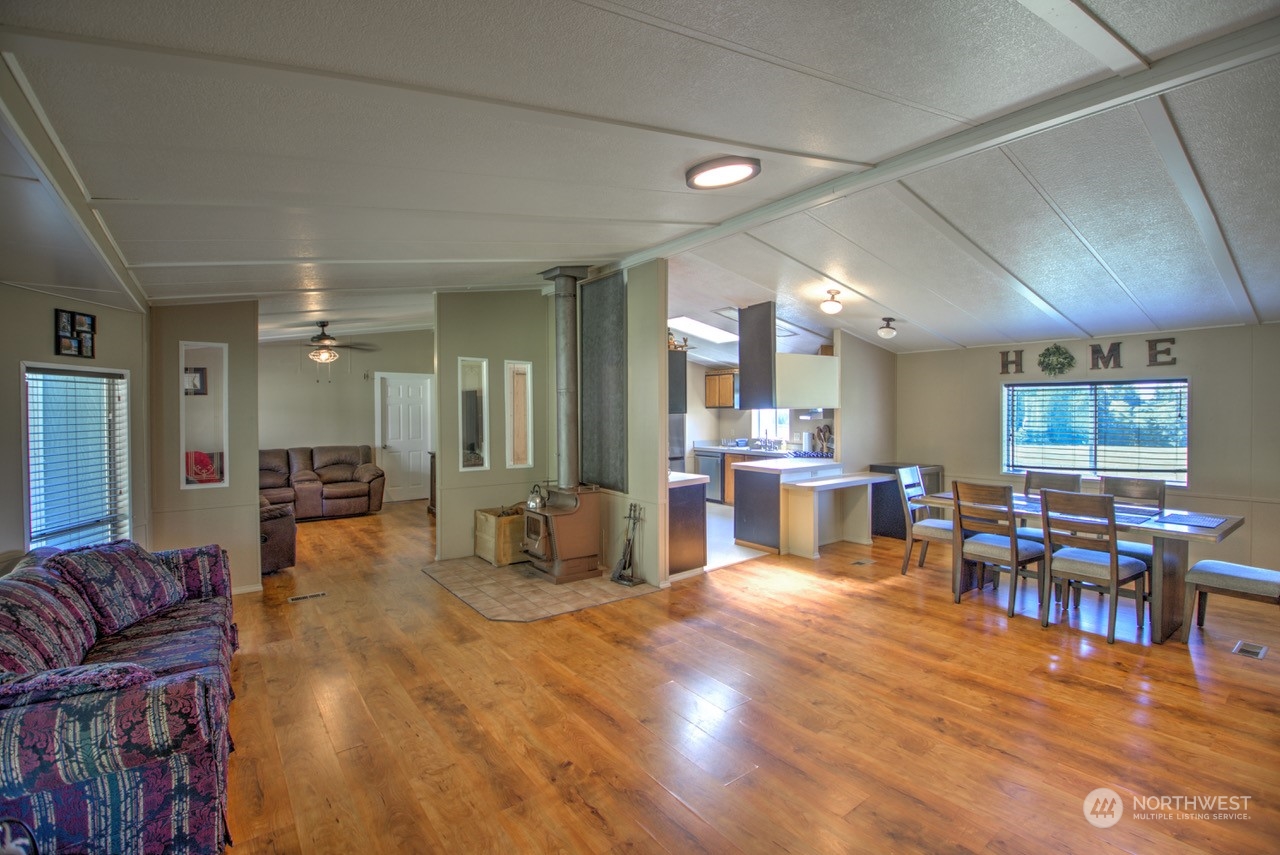 435 Jones Road Winlock, WA 98596 - Photo 21 of 30 a living room with lots of furniture and kitchen view
