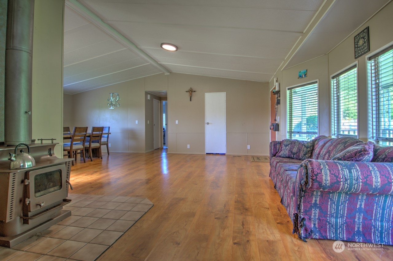 435 Jones Road Winlock, WA 98596 - Photo 22 of 30 a living room with furniture and a flat screen tv
