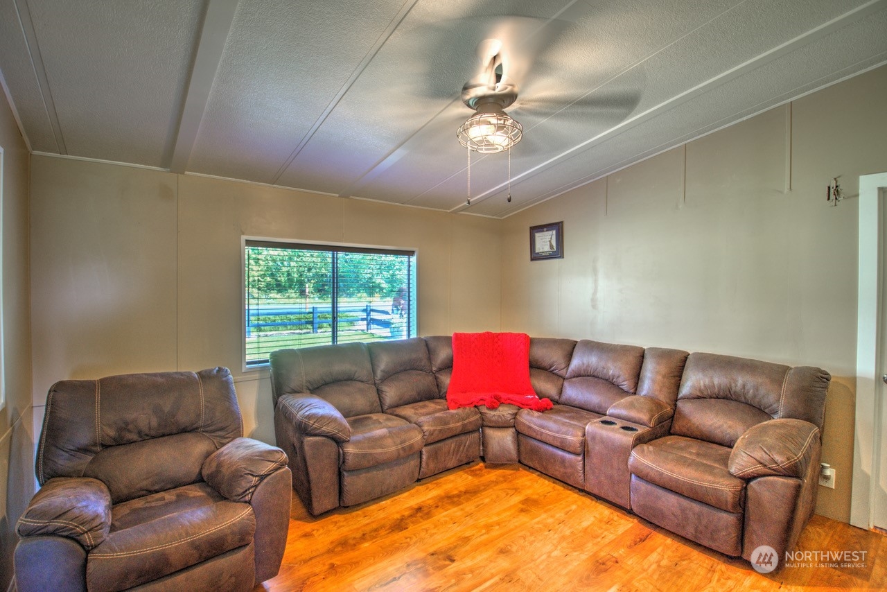 435 Jones Road Winlock, WA 98596 - Photo 23 of 30 a living room with furniture and a window