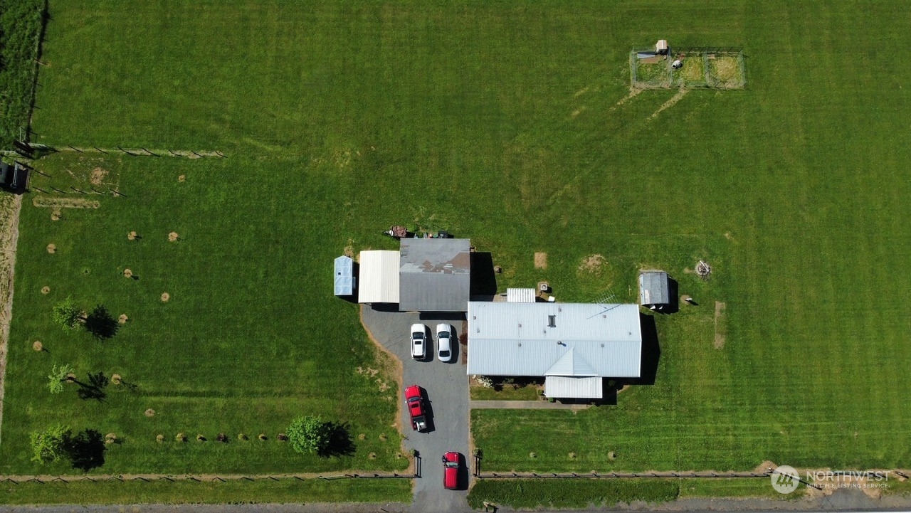 435 Jones Road Winlock, WA 98596 - Photo 26 of 30 an aerial view of a house with a yard basket ball court and outdoor view