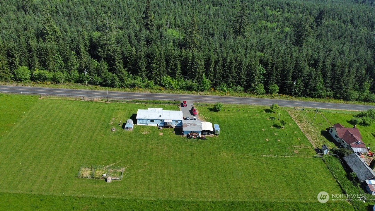 435 Jones Road Winlock, WA 98596 - Photo 27 of 30 a view of a golf course with a lake
