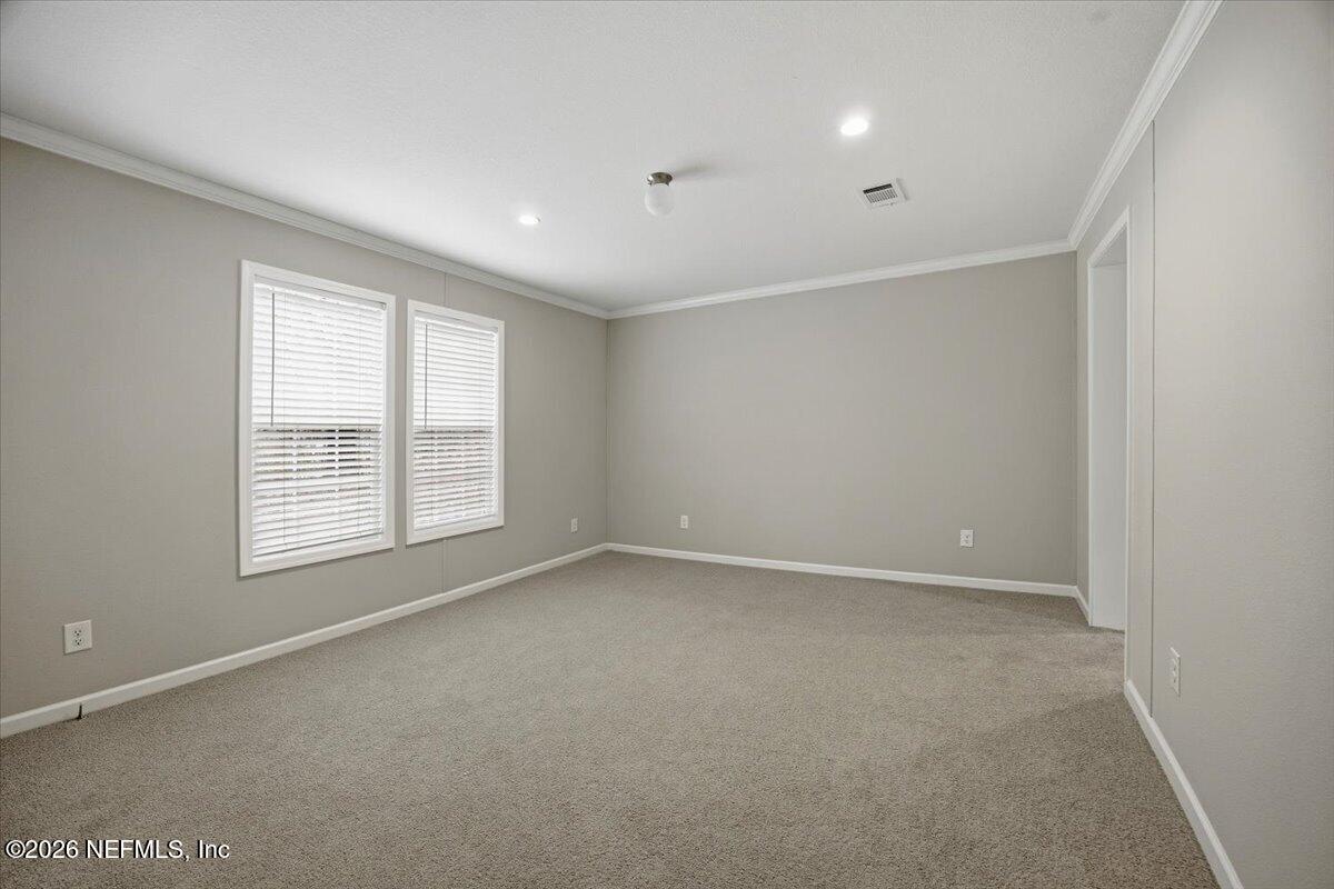 6067 Taft Road Macclenny, FL 32063 - Photo 12 of 23 a view of an empty room with a window