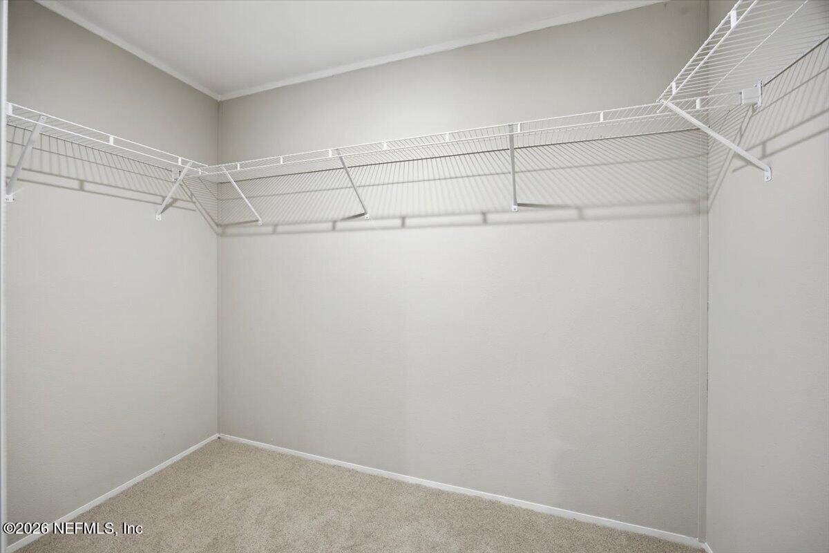 6067 Taft Road Macclenny, FL 32063 - Photo 14 of 23 a view of a room with racks on the wall