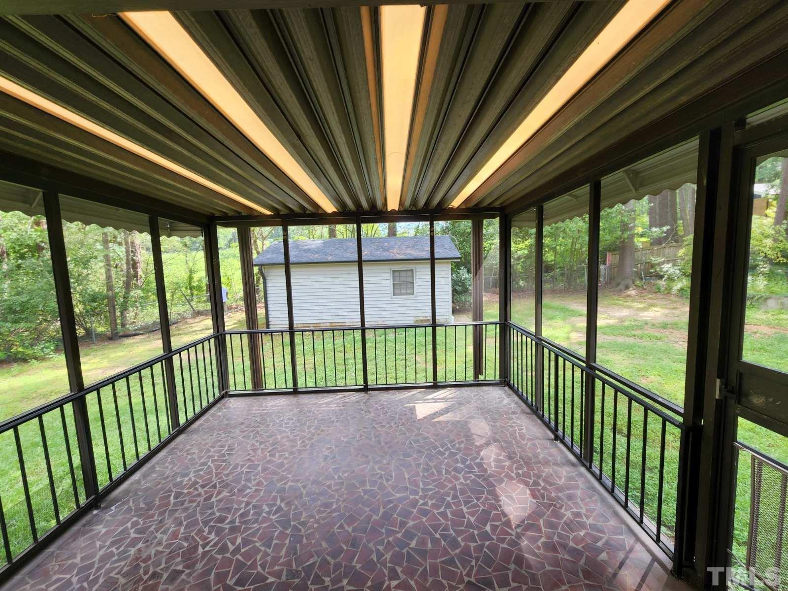 2764 Milburnie Road Raleigh, NC 27610 - Photo 34 of 39 a view of a porch