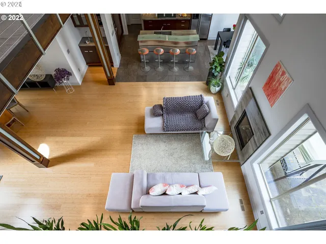 a living room with furniture and a rug