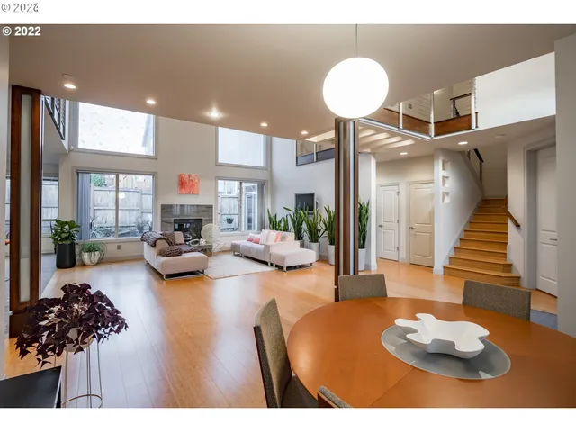 a living room with furniture and a table
