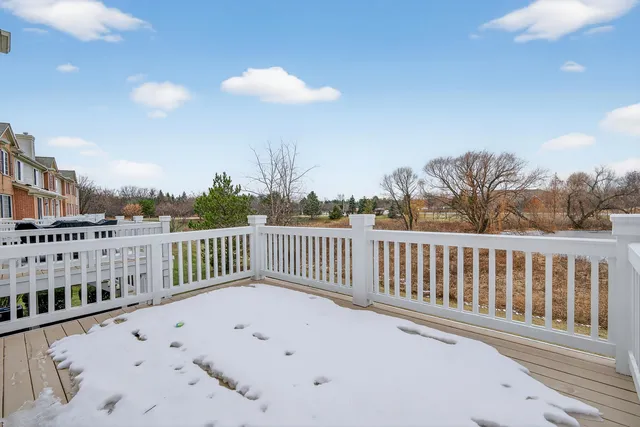 a view of balcony with furniture