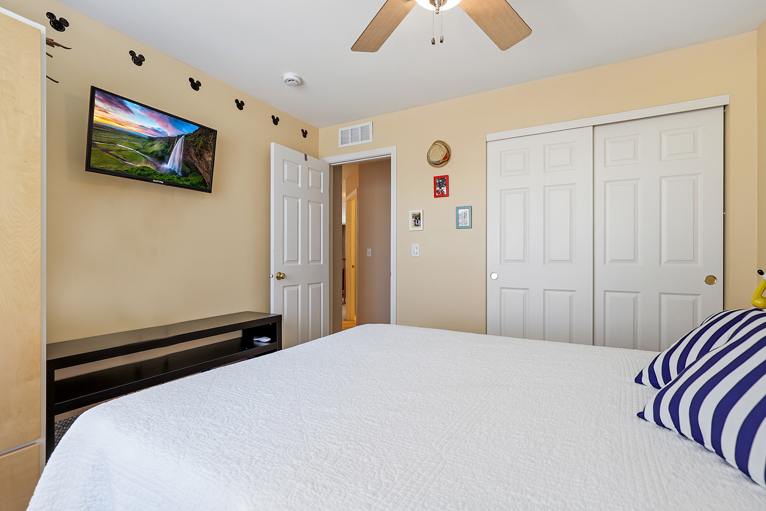 749 Lenox Avenue Bolingbrook, IL 60490 - Photo 21 of 33 a bedroom with a bed and a flat screen tv