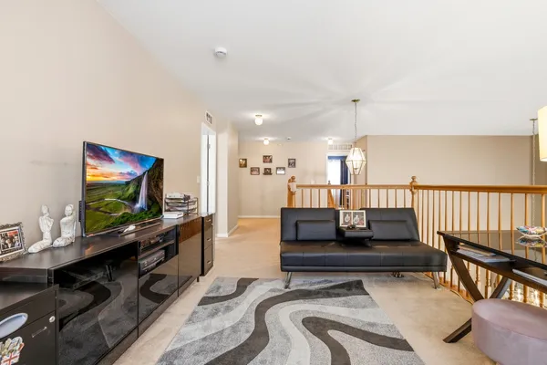 a view of parking garage with cars