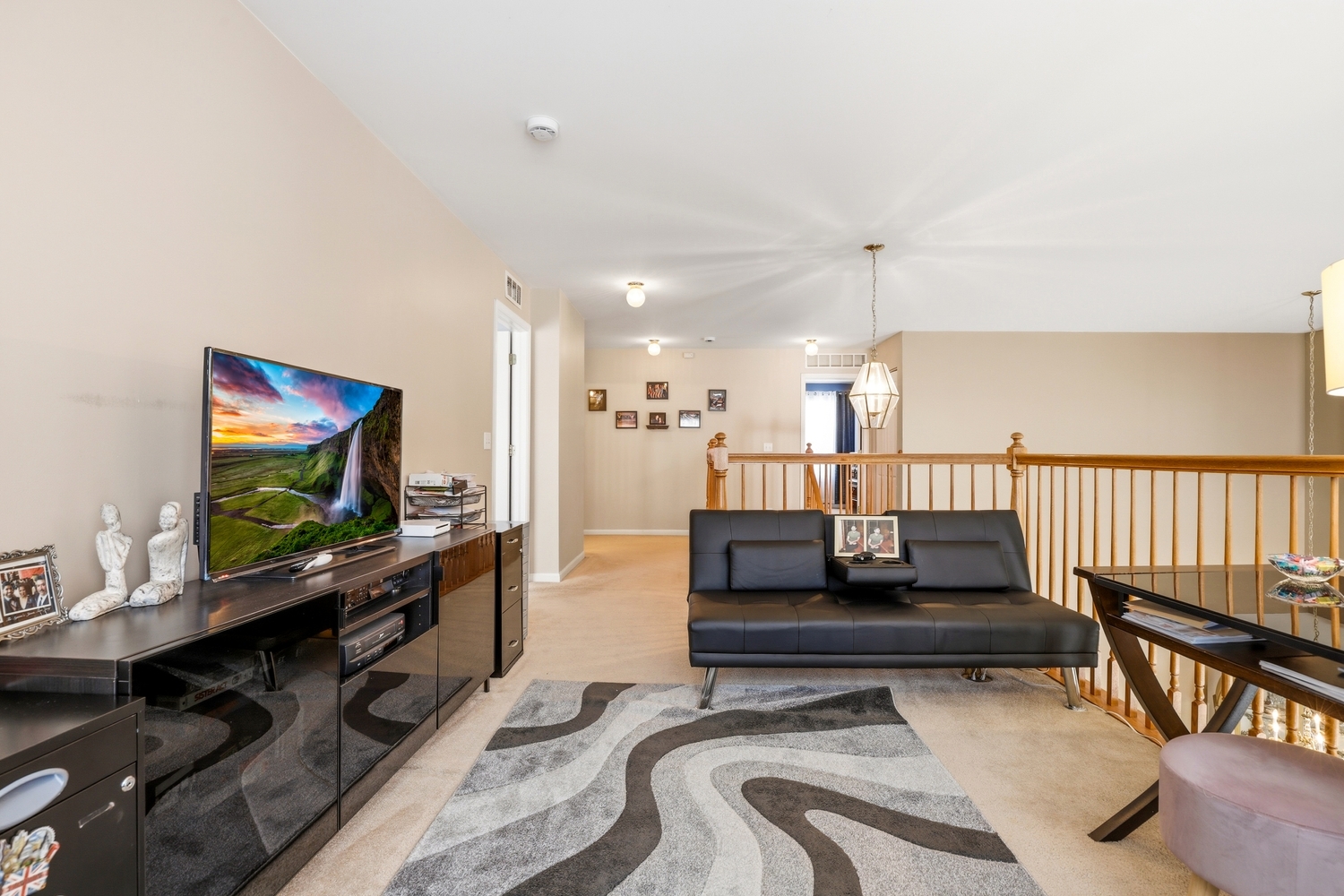 749 Lenox Avenue Bolingbrook, IL 60490 - Photo 24 of 33 a living room with furniture and a flat screen tv