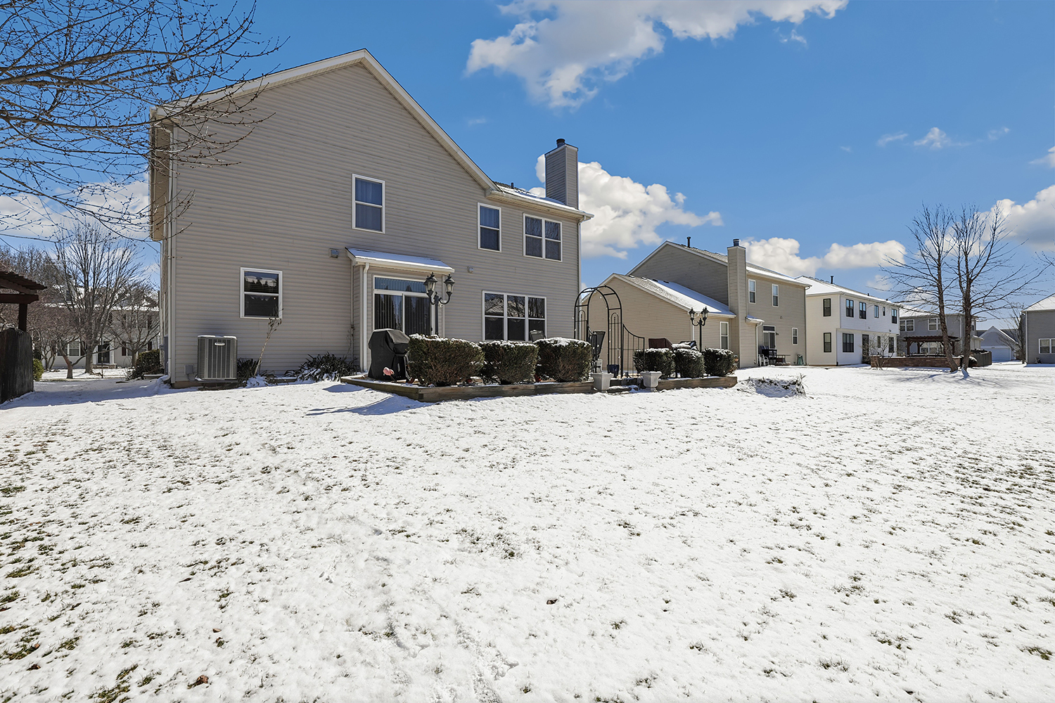 749 Lenox Avenue Bolingbrook, IL 60490 - Photo 29 of 33 a view of the house with a yard