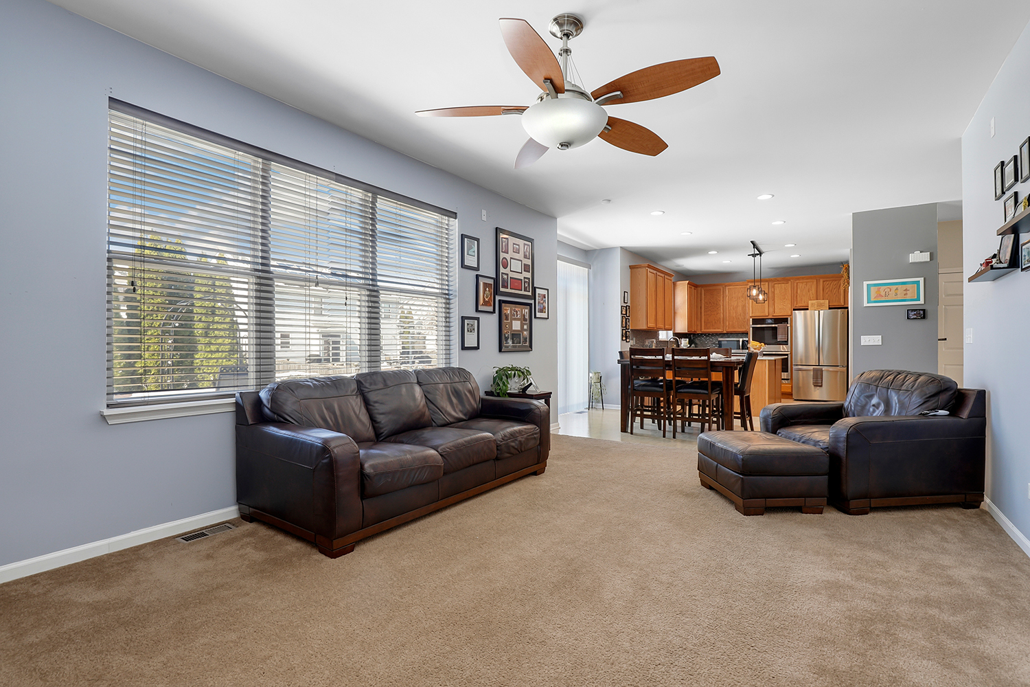 749 Lenox Avenue Bolingbrook, IL 60490 - Photo 3 of 33 a living room with furniture and a large window