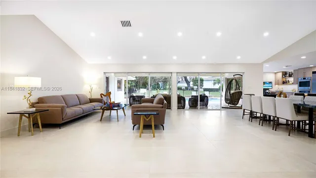 a bathroom with a glass shower door and a bathtub
