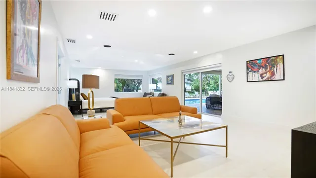 a spacious bathroom with a double vanity sink mirror double and shower