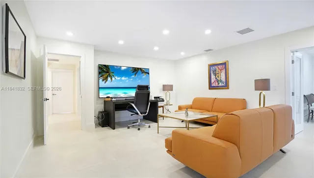 a view of a house with a yard porch and sitting area