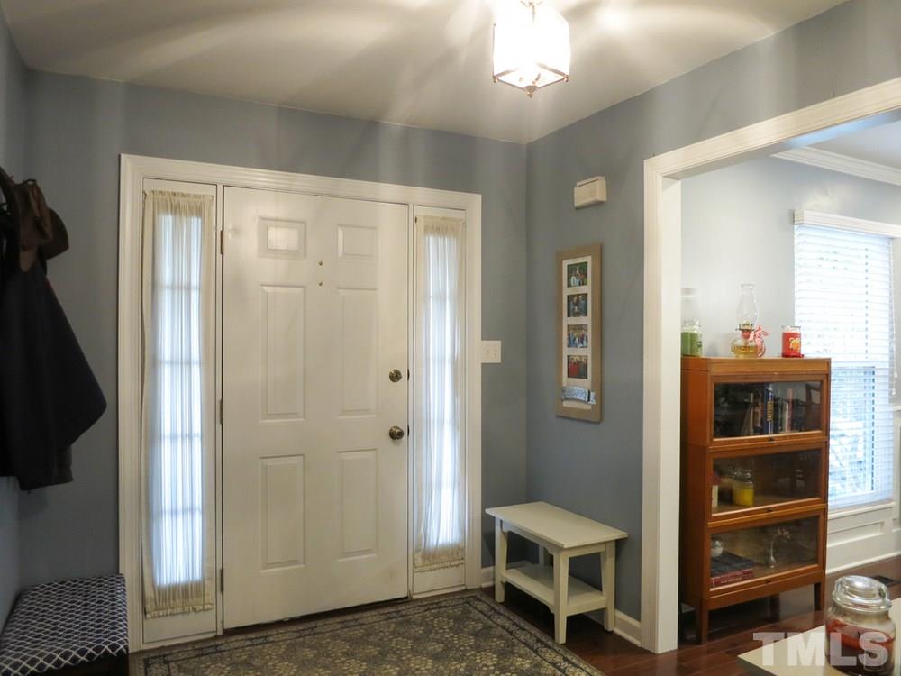 4516 Wingate Drive Raleigh, NC 27609 - Photo 3 of 25 a room with furniture and cabinets