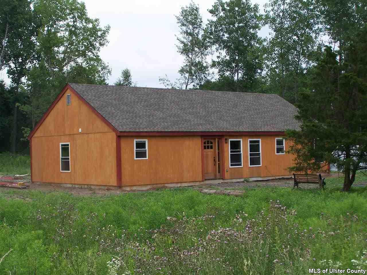 60 Piazza Road Kerhonkson, NY 12446 - Photo 3 of 14 a front view of house with yard and green space